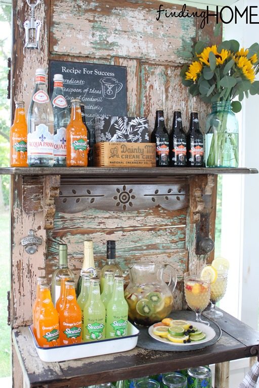 Turn an old door into an <a href="http://findinghomefarms.com/upcycled-vintage-door-beverage-bar-station/" target="_blank">outdoor bar station</a>.