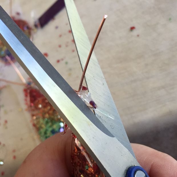 Trim any excess resin with some scissors.