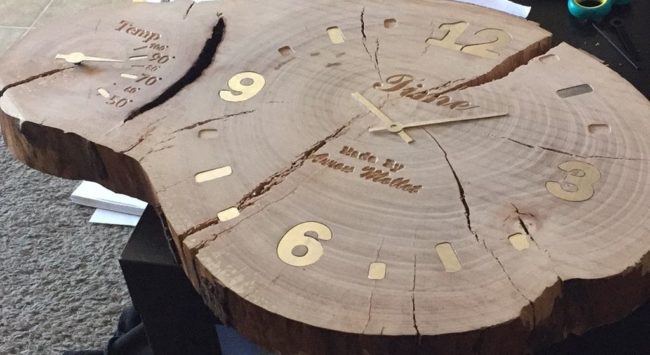 Using a CNC router, he engraved the numbers onto the clock face and added an aluminum inlay for a cool look.