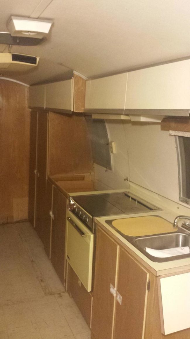 After shifting some things around, he managed to get all the kitchen cabinets on one side. This helped the inside feel more functional.