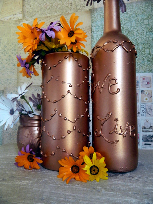 Decorate bottles and paint them to create cute vases.