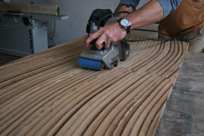 No one likes a rough table top! Smooth it out with a belt sander.