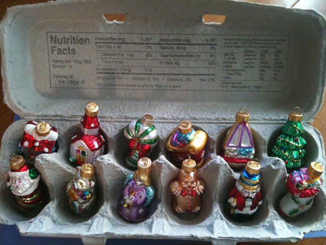 Keep those empty egg cartons and store fragile items like Christmas ornaments in them.