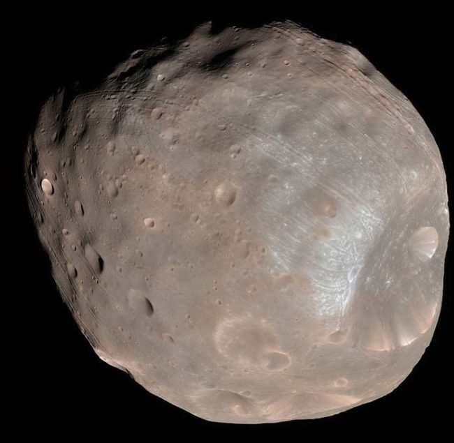 This is Phobos, one of Mars' two moons. It's a small potato-shaped rock that makes its way around the red planet once every seven hours.