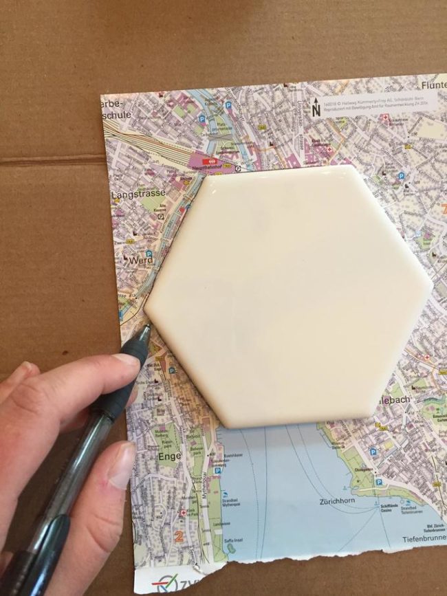 First, GoldenBaby traced out the portions of the maps that they wanted to use for the coasters.