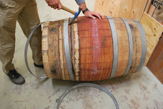 First he had to find some wine barrels -- he got two from a local reseller and removed the metal rings.