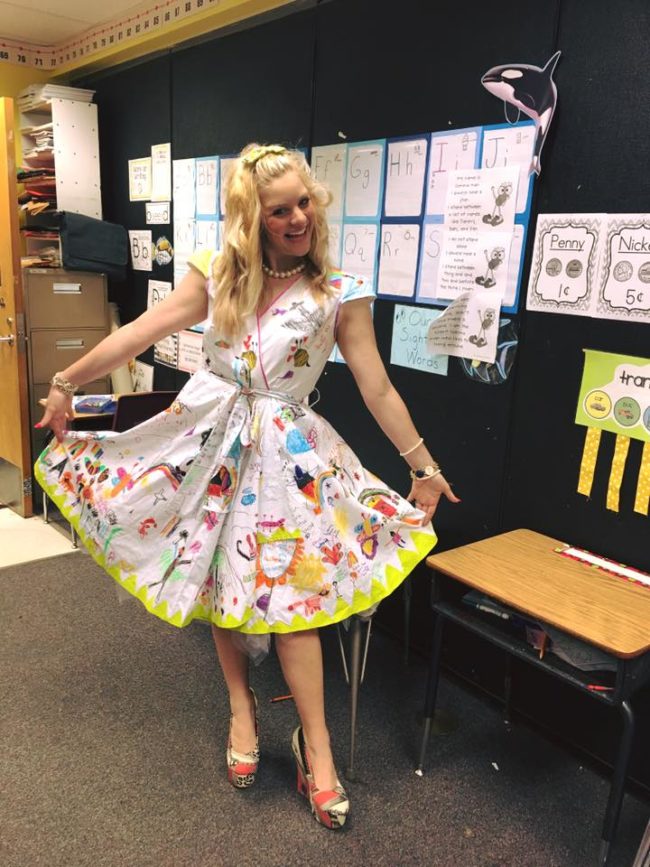 This year, she decided to commemorate her beloved class by letting them do something seriously adorable to her dress.