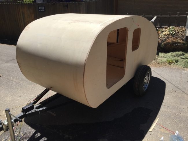 After making sure all the wiring was in place, YouLoseTheGameTony added the outer skin to the camper.