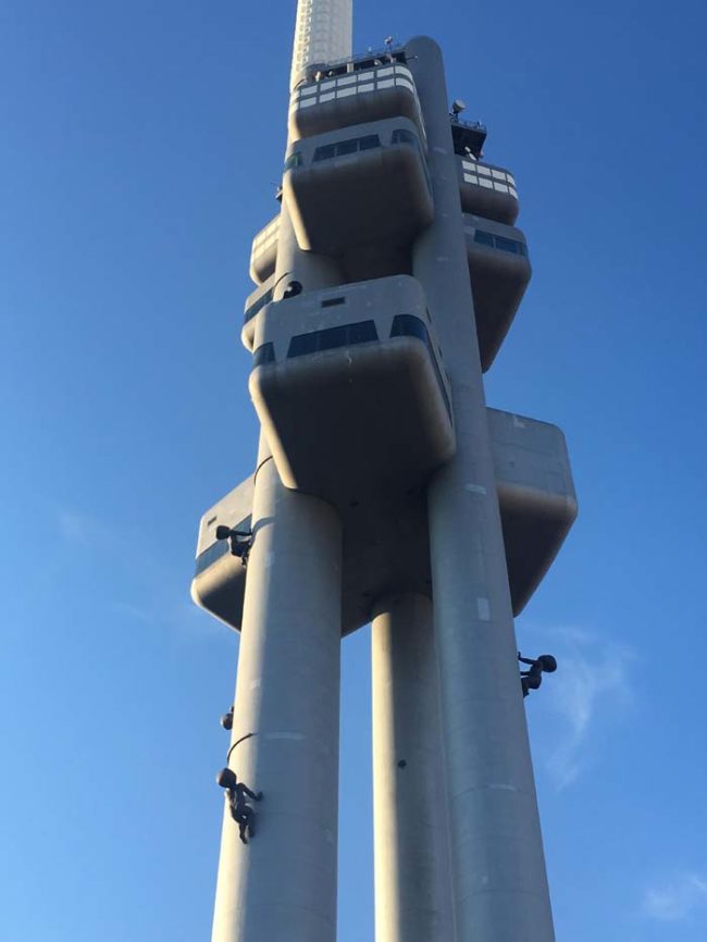 Right about now you're probably thinking, what are those things on the side of the tower's support beams?