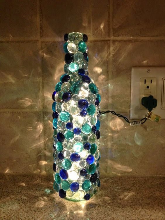 Glue glass beads to an old wine bottle to recreate <a href="http://recycledawblog.blogspot.com/2015/05/diy-glass-bead-wine-bottle.html?m=1" target="_blank">this</a> stunning design.