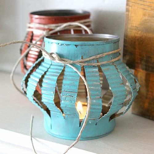 Get a rustic vibe going with these <a href="http://decoart.com/project/tin-can-tea-lights" target="_blank">tin can lanterns</a>. Be sure to use battery-operated tea lights!