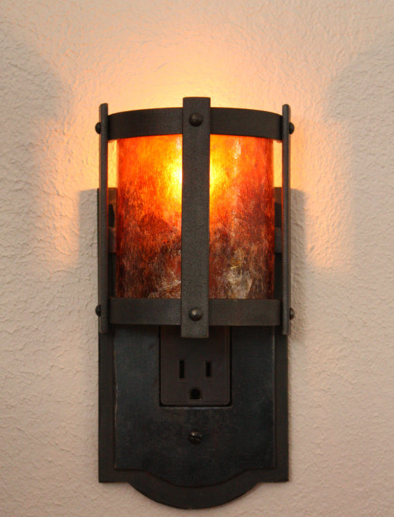 Slay those industrial vibes with an <a href="https://www.etsy.com/listing/88817117/forged-steel-night-light-with-amber-mica?ga_order=most_relevant&amp;ga_search_type=all&amp;ga_view_type=gallery&amp;ga_search_query=night%20light&amp;ref=sr_gallery_42" target="_blank">amber and forged steel night light</a>.