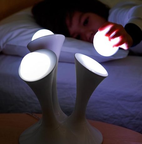 This <a href="http://www.hearthsong.com/glo-light-nightlight-with-portable-glowing-balls.htm?aff=10051&amp;gclid=CM-w8faX380CFdhahgodqkMIxg" target="_blank">night light</a> comes with portable components you can take to the bathroom (or the fridge) with you.