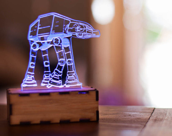 Any Star Wars fanatic would love <a href="https://www.etsy.com/listing/228132300/at-at-walker-lamp-star-wars-lamp-star?ga_order=most_relevant&amp;ga_search_type=all&amp;ga_view_type=gallery&amp;ga_search_query=night%20light&amp;ref=sr_gallery_13" target="_blank">this little guy</a>.