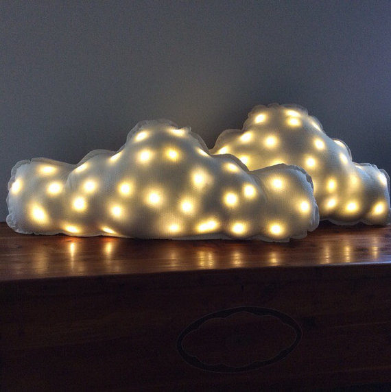 These <a href="https://www.etsy.com/listing/252626998/cloud-shaped-pillow-set-illuminated-bed?ga_order=most_relevant&amp;ga_search_type=all&amp;ga_view_type=gallery&amp;ga_search_query=night%20light&amp;ref=sr_gallery_17" target="_blank">night lights</a> double as pillows the kiddos can cling to when things go bump in the night.