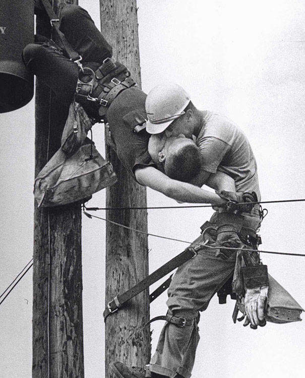 A utility worker giving mouth-to-mouth to a coworker after he contacted a high voltage wire in 1967.