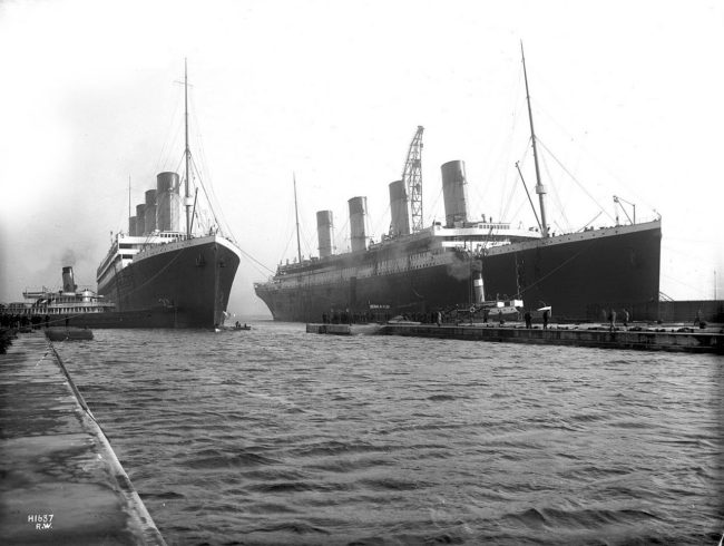 The Olympic (left) next to the more famous Titanic, probably the only photograph of the two sister ships together. March 6, 1912.