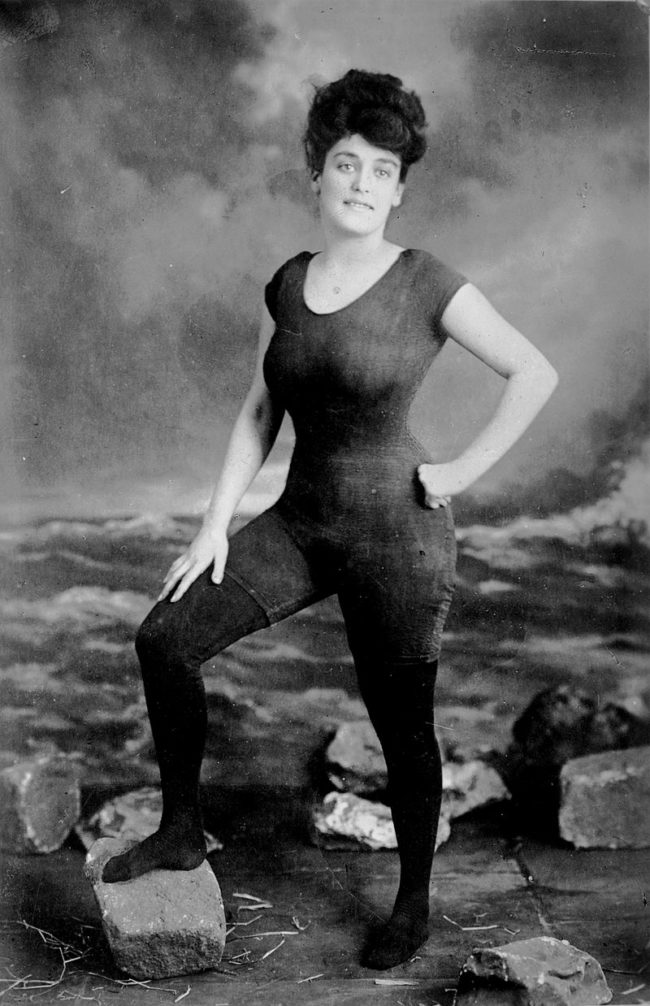 Here Annette Kellerman promotes a woman's right to wear a fitted one-piece bathing suit in 1907. She was later arrested for indecency.