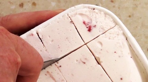 Make scooping ice cream easier by cutting it in squares with a knife that was run under hot water.