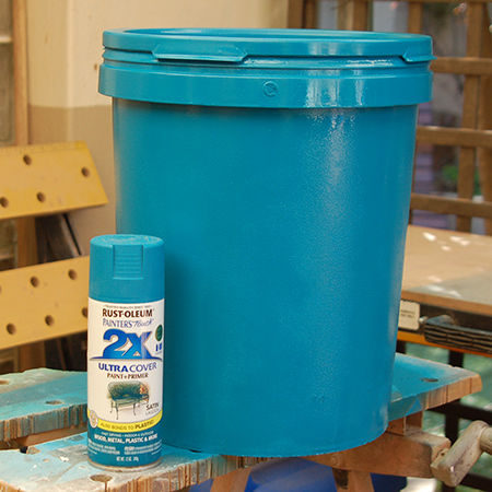 She used two coats of a Rust-Oleum paint to give the buckets a pop of color. 