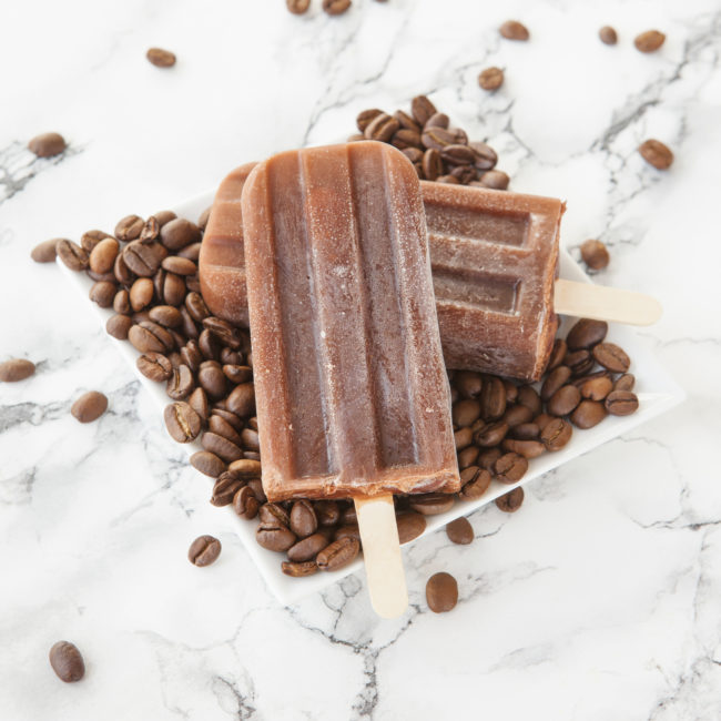 Ditch hot coffee on summer mornings and make these <a href="http://theviewfromgreatisland.com/iced-coffee-popsicles/" target="_blank">iced coffee pops</a> instead!