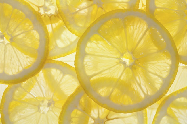 Freeze lemon slices and pop a few into soda or water to keep drinks cool, refreshing, and lemony.