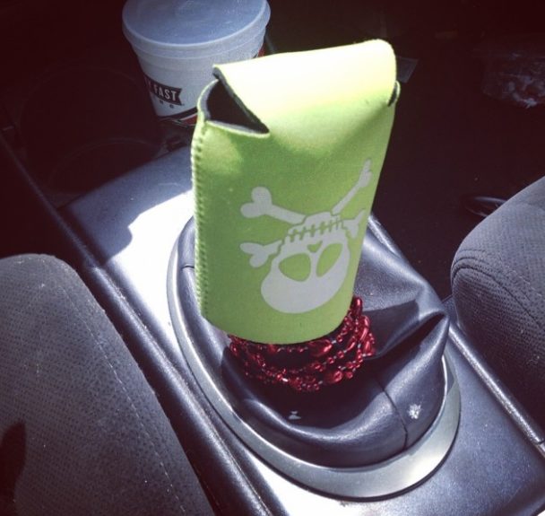 Use a drink cozy to protect your hand from your scorching-hot gear shift.