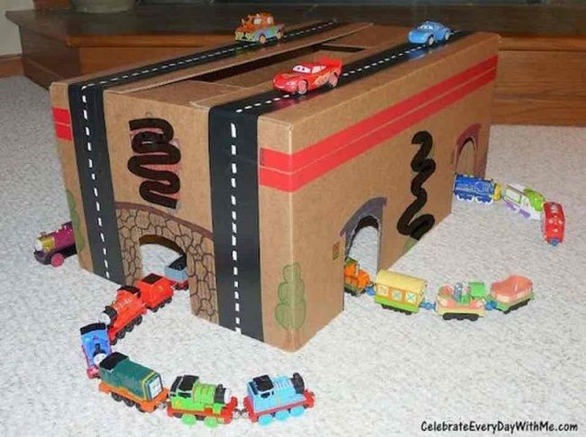 Get on track with this <a href="http://celebrateeverydaywithme.com/diy-project-for-your-train-loving-car-racing-kid/" target="_blank">train station</a>.