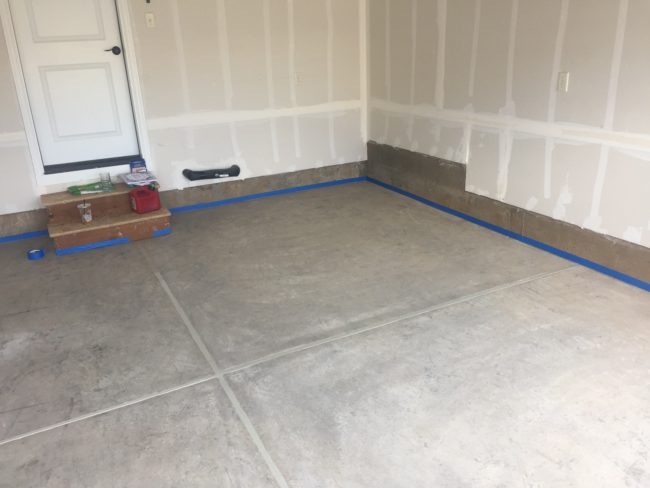 He then added blue painter's tape around the perimeter of the garage.