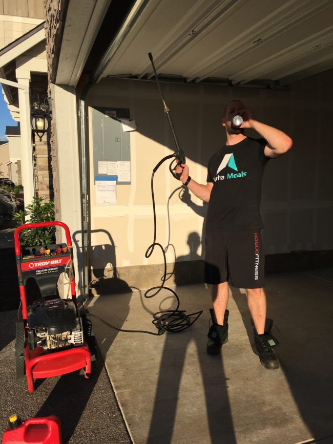 The first thing he had to do was power wash the living hell out of the garage floor to give himself a clean canvas.