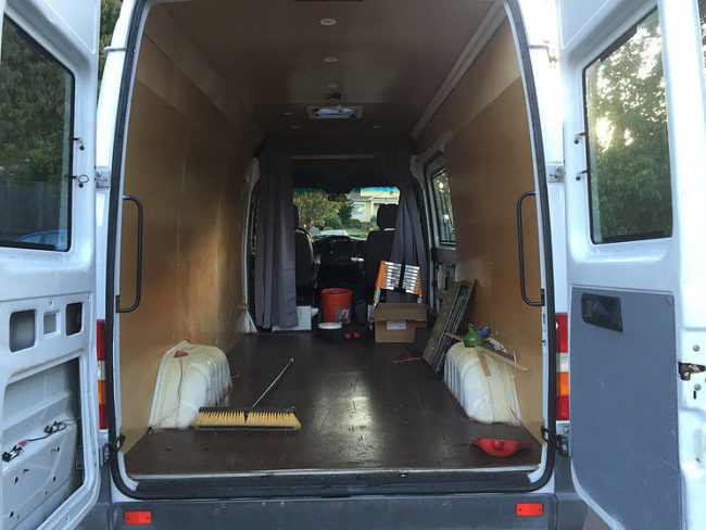 The plywood was flexible enough to bend to the curve of the van's interior.