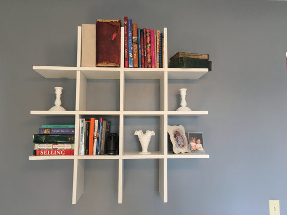 Never lose <a href="https://www.etsy.com/listing/270008627/tic-tac-toe-bookshelf?ga_order=most_relevant&amp;ga_search_type=all&amp;ga_view_type=gallery&amp;ga_search_query=bookshelf&amp;ref=sr_gallery_5" target="_blank">tic tac toe</a> again.