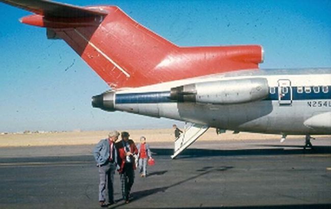 At about 7:40 p.m., after refueling, the plane took off. Once in the air, Cooper ordered the remaining crew members to the cockpit while he stayed in back. Around 8 p.m., a warning light flashed in the cockpit indicating that the aft door had been opened.