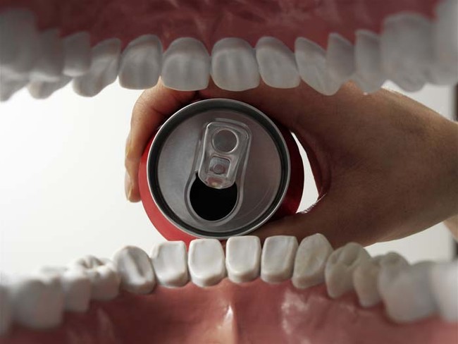 For an interesting kids science experiment, soak a baby tooth in Coke. After two weeks, pull it out and see just how much has dissolved from the sugar.