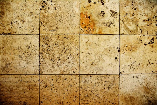Clean your grout by pouring Coke on the floor for a few minutes. Wipe it up and your grout will be as good as new.