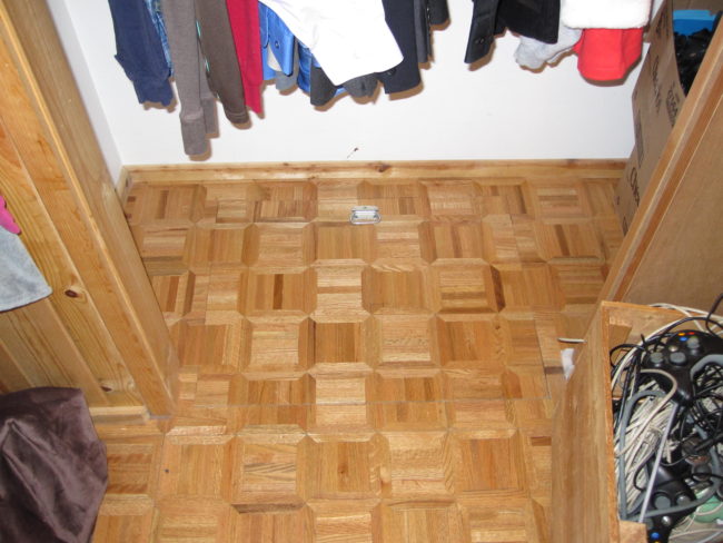 While Matt was pretty oblivious to the secret hiding under the cardboard boxes, his wife noticed a panel in the floor and said to him, "did you know we had a trapdoor?"