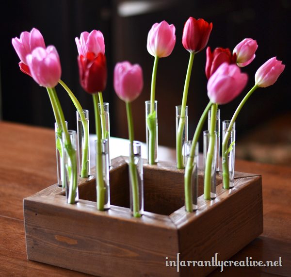 Make a unique <a target="_blank" href="http://www.infarrantlycreative.net/floral-centerpiece-with-tulips/">floral centerpiece</a> and wow all of your dinner guests!