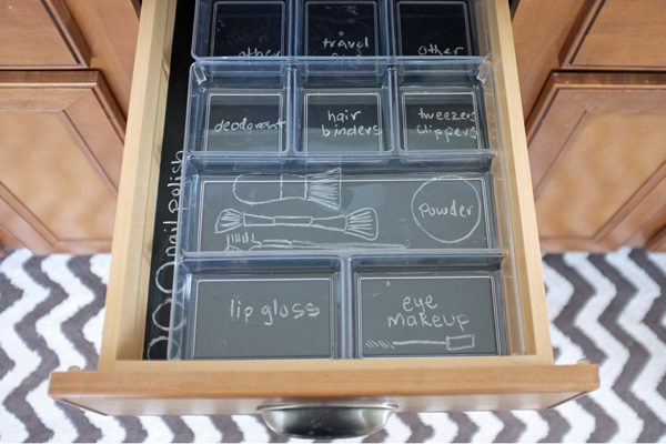I so need this for my <a target="_blank" href="http://www.tealandlime.com/2012/06/a-new-way-to-line-your-drawers-make-organizing-fun/">bathroom drawer</a>!
