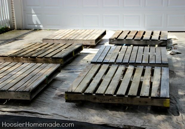 These crafters purchased six wooden pallets from a local pallet manufacturer, however you can just go around to local businesses and score some for free. The more pallets, the larger your awesome deck will be!