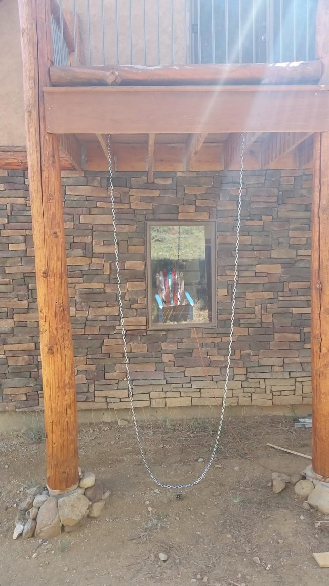 Using a 20-foot chain, he created a loop and hung it from the underside of his deck.