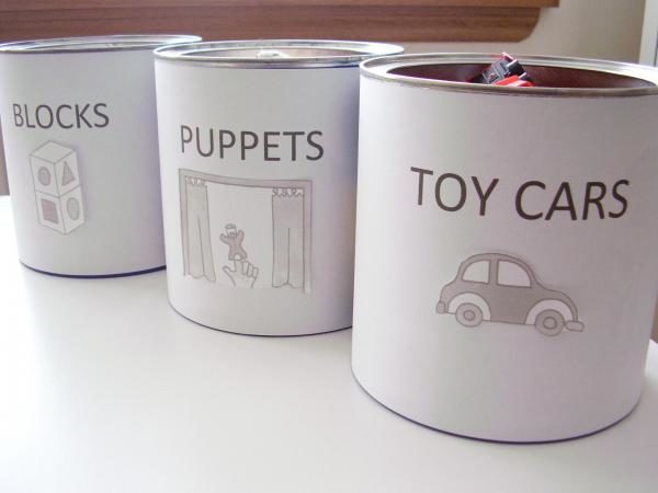 Add labels to your old coffee cans to create cute organizers.