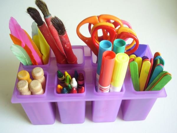 Popsicle molds make for mess-free craft tables.