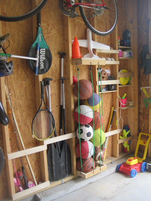 This ball <a href="http://designedtodwell.blogspot.com/2011/08/making-use-of-some-studs.html" target="_blank">storage alternative</a> will declutter your garage in no time at all.