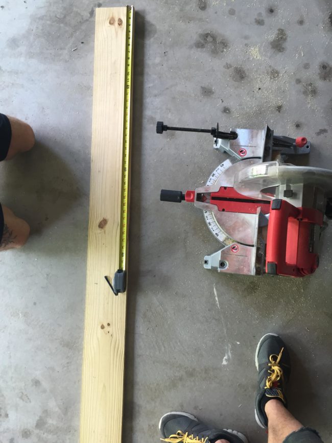 His goal? An accent wall! So he got to measuring, used a miter saw, and cut pieces of wood to match the design he had in mind.