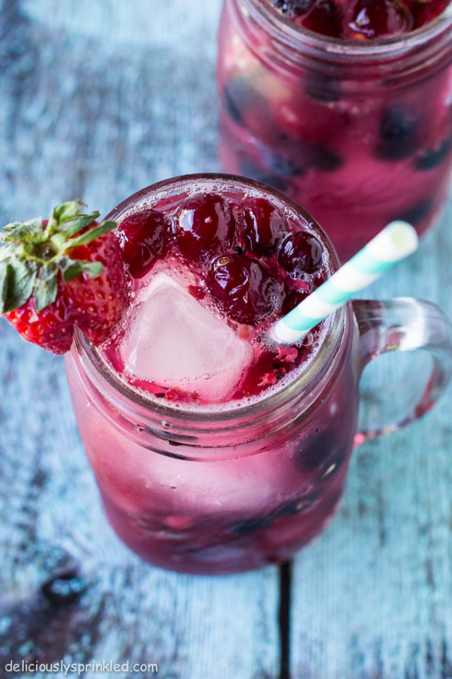 Your non-alcohol-consuming and/or underage friends can get in on the fun with this <a href="http://deliciouslysprinkled.com/berry-spritzer/" target="_blank">very berry spritzer</a>.
