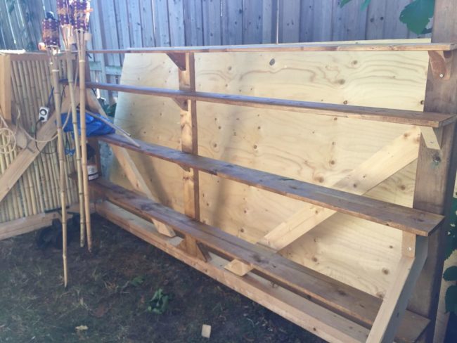 Inside goes some handy shelving because booze storage is important.