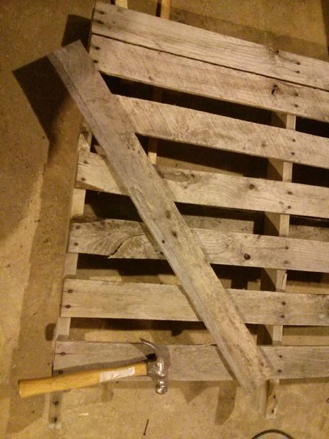 But this pirate chest wasn't finished yet...he ripped apart this old pallet and finished the pieces with a mahogany stain.