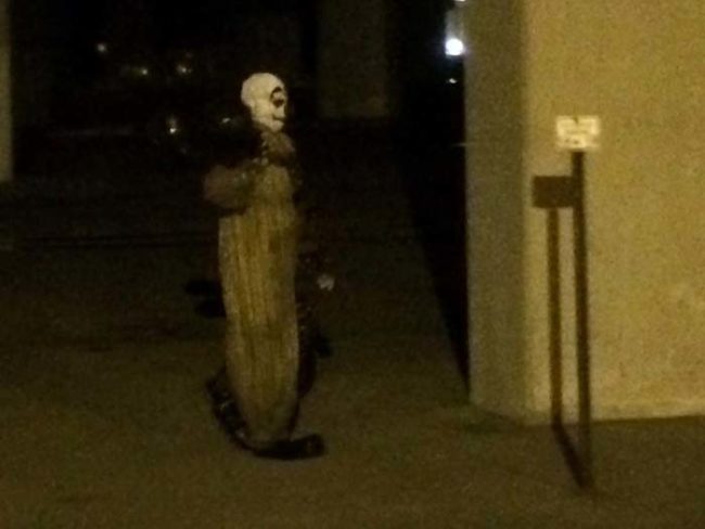 This brave local resident had the fortitude to take a few pictures of the clown walking mysteriously into the night with handful of black balloons. They even created a Facebook page where locals can share their encounters with Gags.