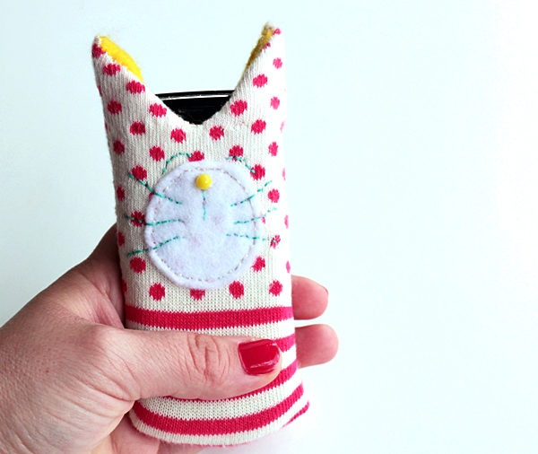 Speaking of cats, how cute is this <a href="http://crafts.tutsplus.com/tutorials/from-sock-to-sleeve-make-a-cute-cat-cover-for-your-phone--craft-9804" target="_blank">phone holder</a>?