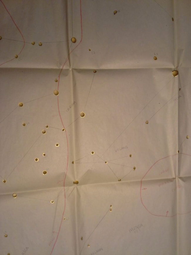 Trace the constellations onto tissue paper and poke a hole where each star is.